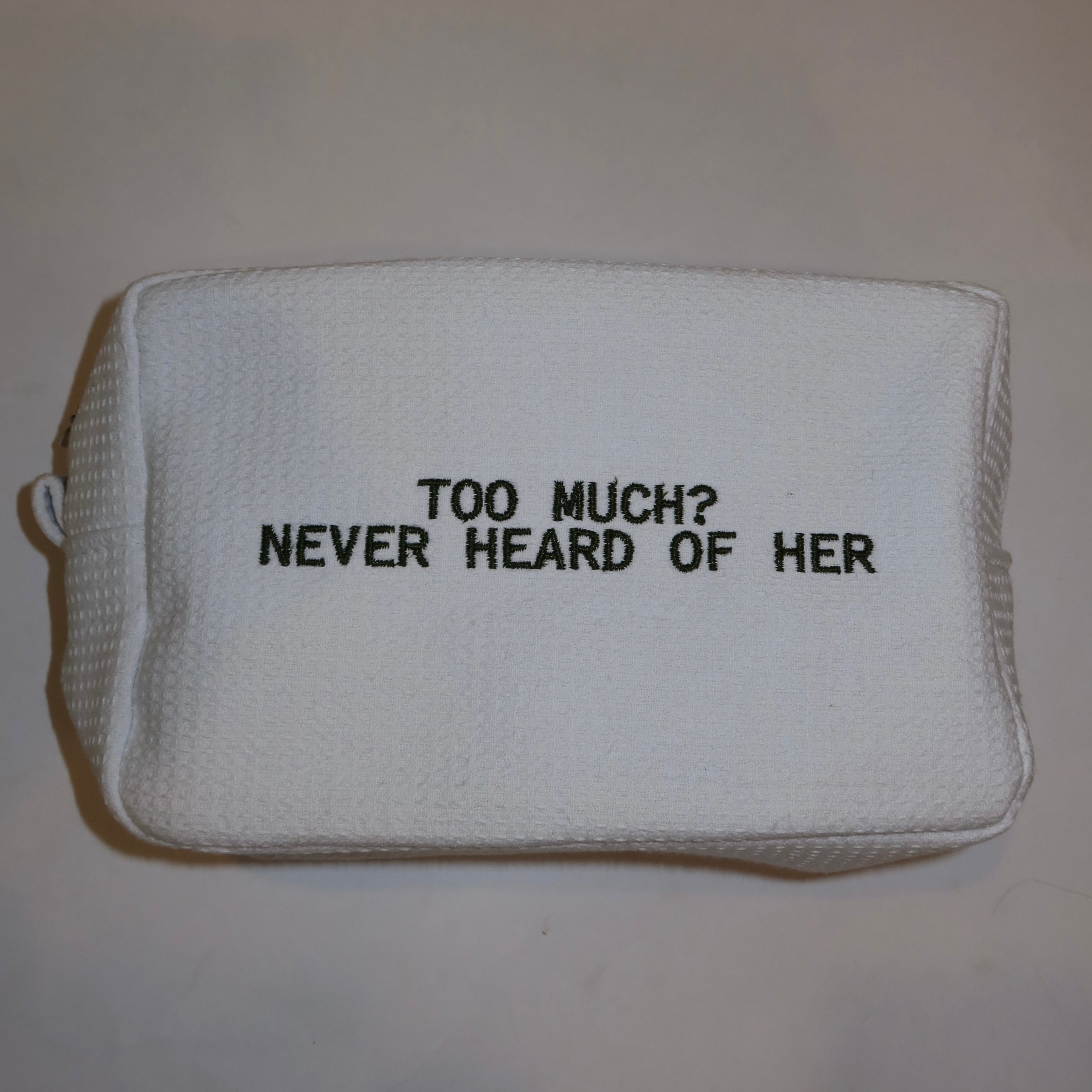 TOO MUCH? TOILETRY BAG